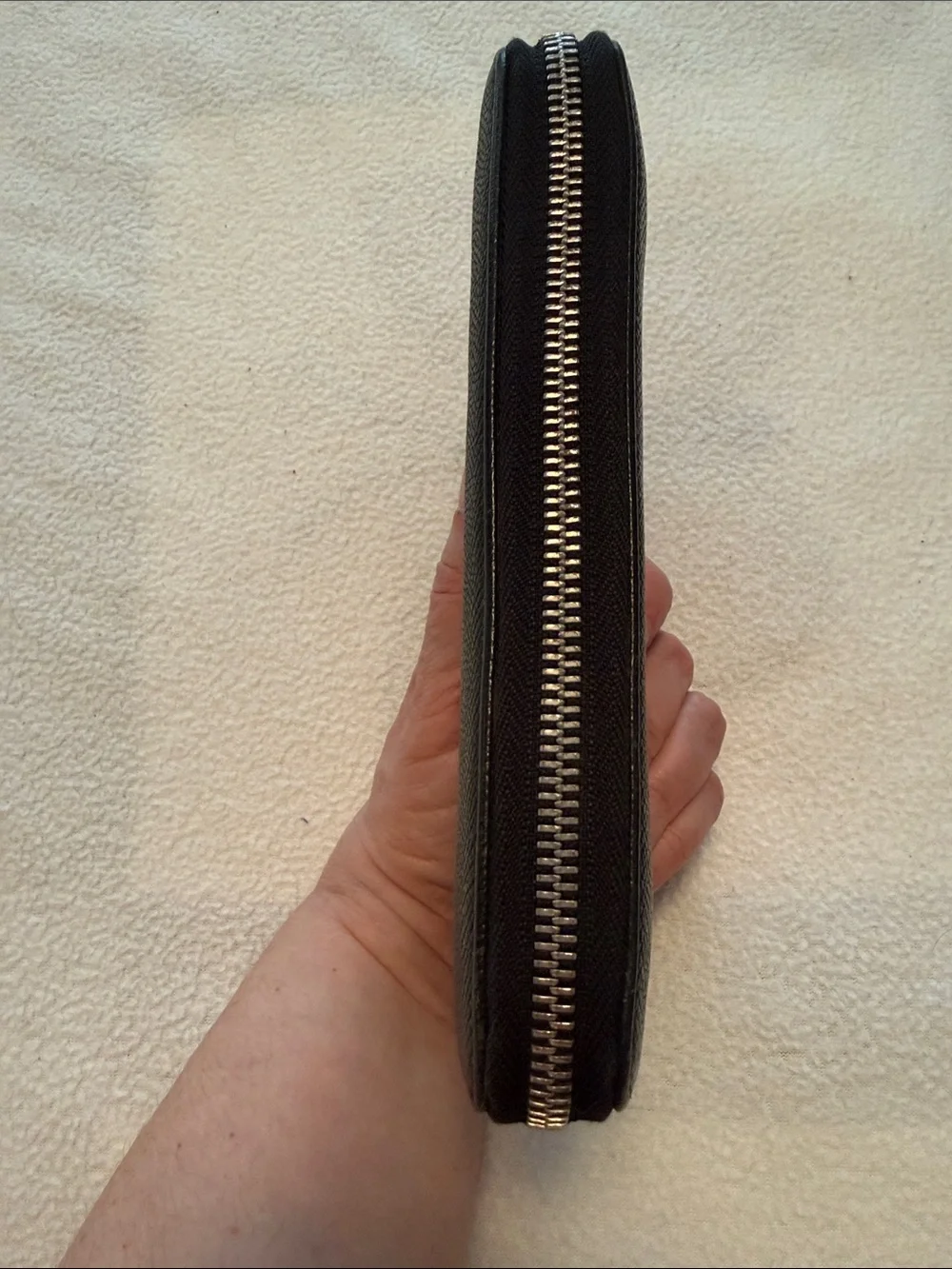 Bvlgari Zip-Around Black Leather wallet with blue interior.